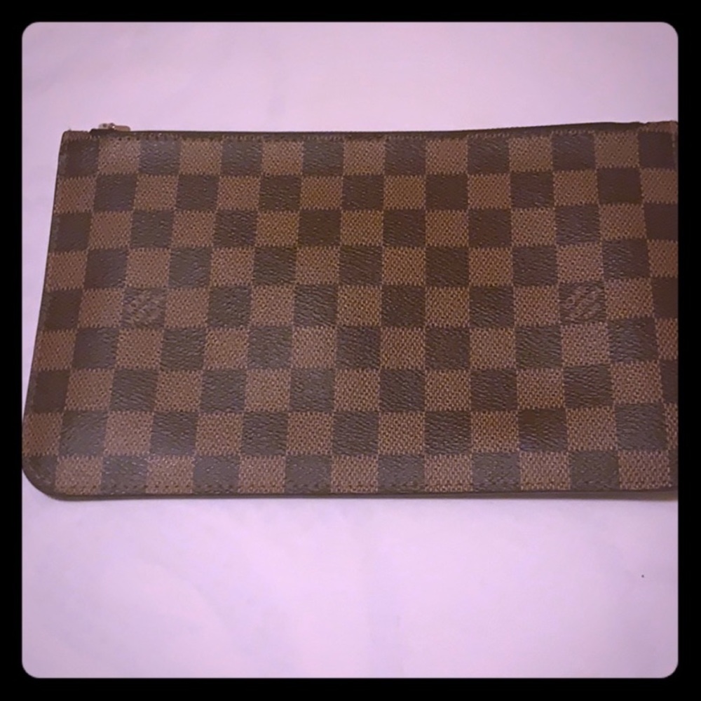 Authentic wristlet.  PRICE IS FIRM PLEASE